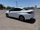Thumbnail of 2024 Aspen White Tricoat Nissan Versa