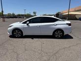 Thumbnail of 2024 Aspen White Tricoat Nissan Versa