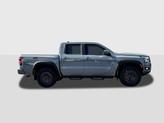 Thumbnail of 2025 Boulder Gray Pearl Nissan Frontier