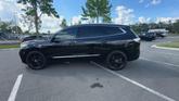 Thumbnail of 2023 Ebony Twilight Metallic Buick Enclave