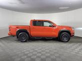 Thumbnail of 2025 Afterburn Orange Nissan Frontier