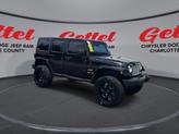Thumbnail of 2018 Black Jeep Wrangler JK Unlimited