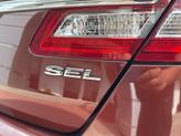 Thumbnail of 2015 Ruby Red Metallic Tinted Clearcoat Ford Taurus
