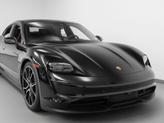 Thumbnail of 2024 Jet Black Metallic Porsche Taycan