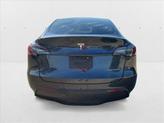 Thumbnail of 2024 Deep Blue Metallic Tesla Model Y