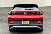 Thumbnail of 2025 aurora red metallic with black roof Volkswagen ID.4