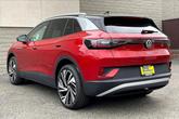 Thumbnail of 2025 aurora red metallic with black roof Volkswagen ID.4
