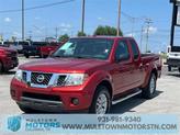 Photo of 2016 Lava Red Nissan Frontier