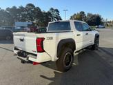 Thumbnail of 2025 White Toyota Tacoma Hybrid