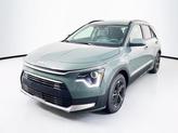 Photo of 2025 Cityscape Green Kia Niro Plug-In Hybrid
