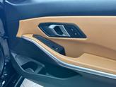 Thumbnail of 2024 Jet Black BMW 330