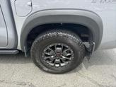 Thumbnail of 2023 Boulder Gray Pearl Nissan Frontier