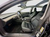 Thumbnail of 2022 Solid Black Tesla Model 3