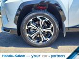 Thumbnail of 2025 Wind Chill Pearl/Midnight Black Metallic Toyota RAV4 Hybrid