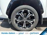 Thumbnail of 2025 Wind Chill Pearl/Midnight Black Metallic Toyota RAV4 Hybrid