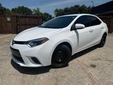 Photo of 2016 Super White Toyota Corolla