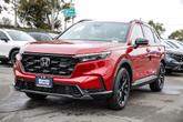 Thumbnail of 2025 Radiant Red Metallic Honda CR-V Hybrid