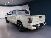 Thumbnail of 2024 Glacier White Nissan Frontier