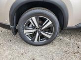 Thumbnail of 2025 Champagne Silver Metallic/Super Black Nissan Rogue
