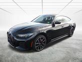 Thumbnail of 2024 Black Sapphire Metallic BMW i4 Gran Coupe