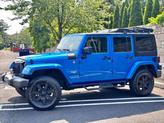 Thumbnail of 2015 Hydro Blue Pearl Jeep Wrangler Unlimited