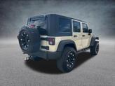 Thumbnail of 2011 Sahara Tan Clearcoat Jeep Wrangler Unlimited
