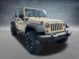 Thumbnail of 2011 Sahara Tan Clearcoat Jeep Wrangler Unlimited