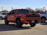 Thumbnail of 2025 Afterburn Orange Nissan Frontier