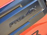 Thumbnail of 2025 Afterburn Orange Nissan Frontier