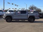 Thumbnail of 2023 Boulder Gray Pearl Nissan Frontier