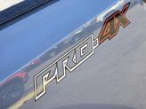 Thumbnail of 2023 Boulder Gray Pearl Nissan Frontier