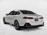 Thumbnail of 2026 Mineral White Metallic BMW 530