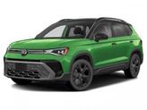 Photo of 2025 Bright Moss Green Metallic/Deep Black Roof Volkswagen Taos