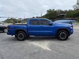 Thumbnail of 2024 Bluestone Pearl Nissan Frontier