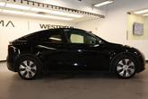 Thumbnail of 2023 Solid Black Tesla Model Y