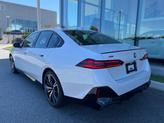 Thumbnail of 2025 Mineral White Metallic BMW 530