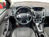 Thumbnail of 2014 Ruby Red Tinted Clearcoat Ford Focus