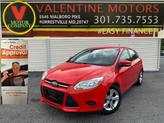Photo of 2014 Ruby Red Tinted Clearcoat Ford Focus