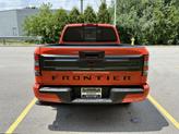 Thumbnail of 2025 Afterburn Orange Nissan Frontier