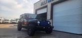 Thumbnail of 2016 Black Clearcoat Jeep Wrangler Unlimited