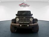 Thumbnail of 2016 Black Clearcoat Jeep Wrangler Unlimited