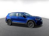 Thumbnail of 2024 Dusk Blue Metallic Volkswagen Taos