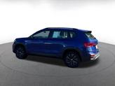 Thumbnail of 2024 Dusk Blue Metallic Volkswagen Taos