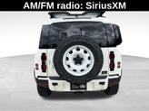 Thumbnail of 2024 Santorini Black Metallic Land Rover Defender