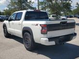 Thumbnail of 2025 Glacier White Nissan Frontier