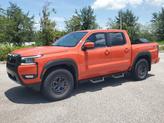 Thumbnail of 2025 Afterburn Orange Nissan Frontier