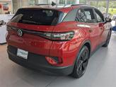 Thumbnail of 2025 Aurora Red Metallic Volkswagen ID.4