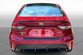 Thumbnail of 2024 Ruby Flare Pearl/Midnight Black Metallic Toyota Corolla