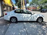 Thumbnail of 2015 Moonlight White INFINITI Q40