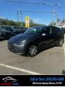 Thumbnail of 2022 Midnight Silver Metallic Tesla Model Y